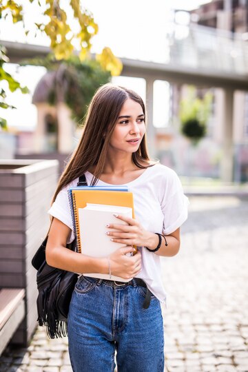 young-talented-female-student-dressed-casual-clothing-walking-around-city-attractive-brunette-woman-enjoying-free-time-outdoors_231208-2115